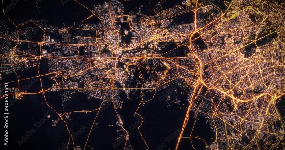 Aerial night view of city of Berlin, Germany. Traffic and street light glowing. Camera flying high above, moving around city from space filming cinematic straight down. 3d animation rendering.