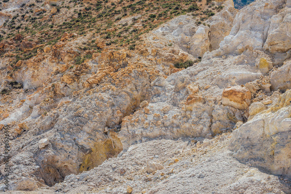 Rocks with sulfur crystals at Nisyros volcano Stefanos crater Greece