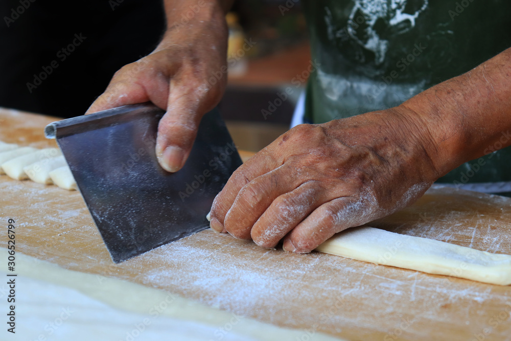 chef preparing dough in kitchen chef preparing dough in kitchen