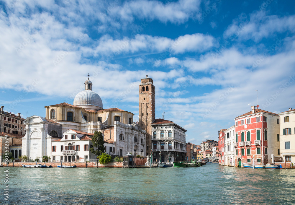 Grand Canal and an ancient cathedral in Venice, Italy.