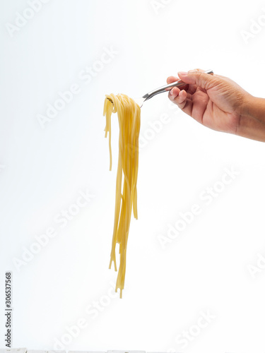 hand holding fork handle roll spaghetti line