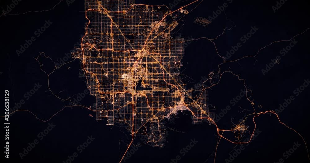 Aerial night view of city of Las Vegas, USA. Traffic and street light glowing. Camera flying high above, moving slowly forward from space filming cinematic straight down. 3d animation rendering.