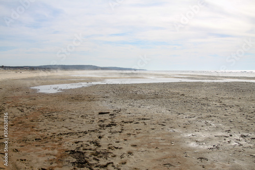 steam from hot springs on the beach