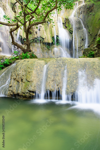 Huge round rock and tranquil pond in rain forest at Thac Voi waterfall  Thanh Hoa