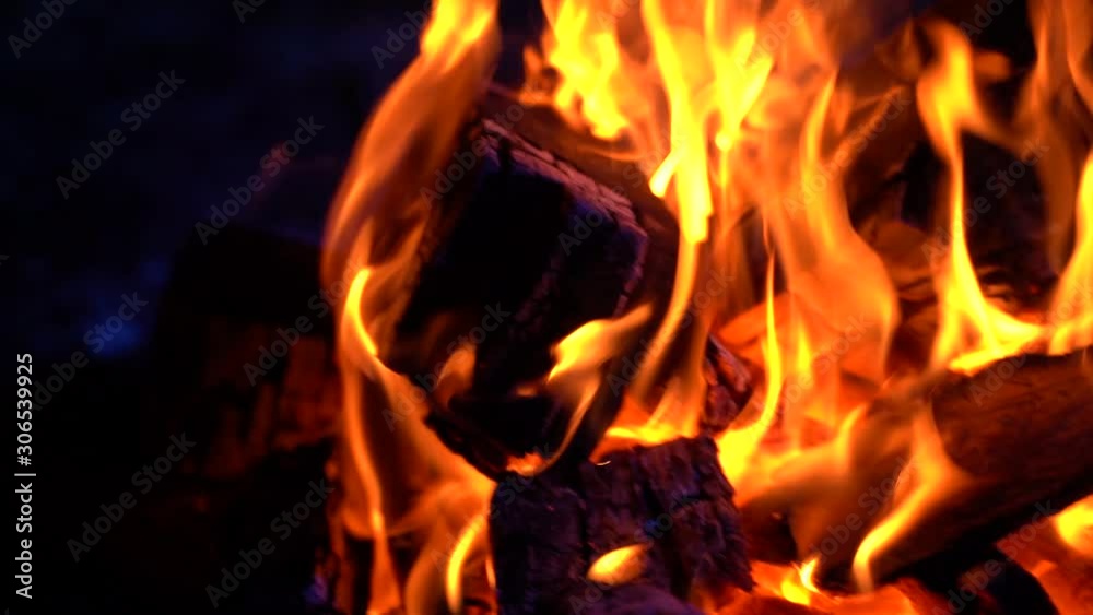Fire in desert at night in moonlight close up shot 100 FPS Fire in desert at night in moonlight close up shot 100 FPS