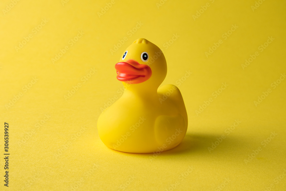 Rubber duck on yellow background minimal creative concept. Stock Photo ...