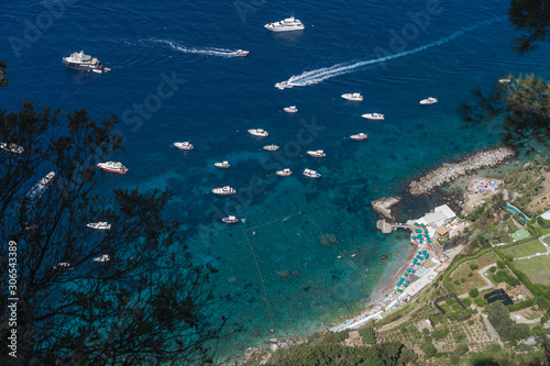 North Capri island harbour with luxury yachts view from villa San Michele in Anacapri