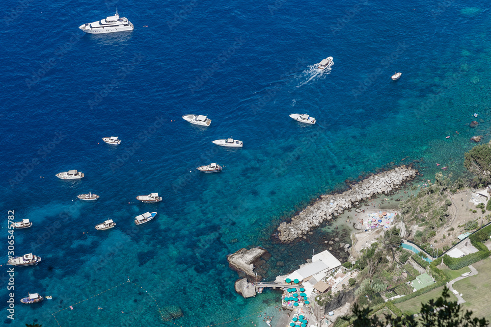 North Capri island harbour with luxury yachts view from villa San Michele in Anacapri