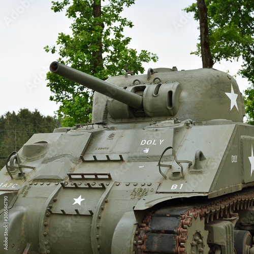 Sherman tank monument in Belgium Ardennes on the river Maas photo