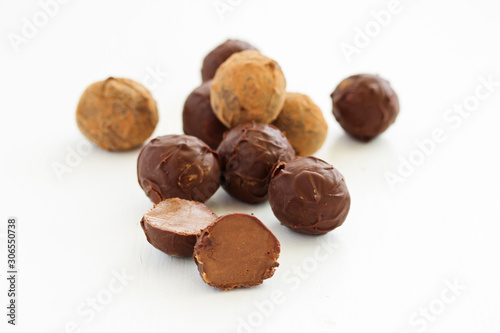 Handmade candies. Lawyer truffle with liqueur and vanilla. Home sweetness. Selective focus.