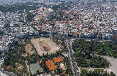 Aerial drone shot of Acropolis of Athens  Olympion Zeus temple  national garden and museum  Olympion Zeus temple  national garden and museum