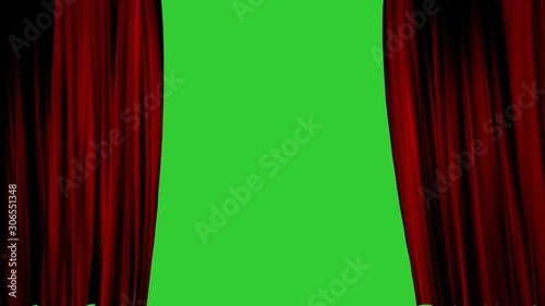 Red curtain opening with green screen background photo