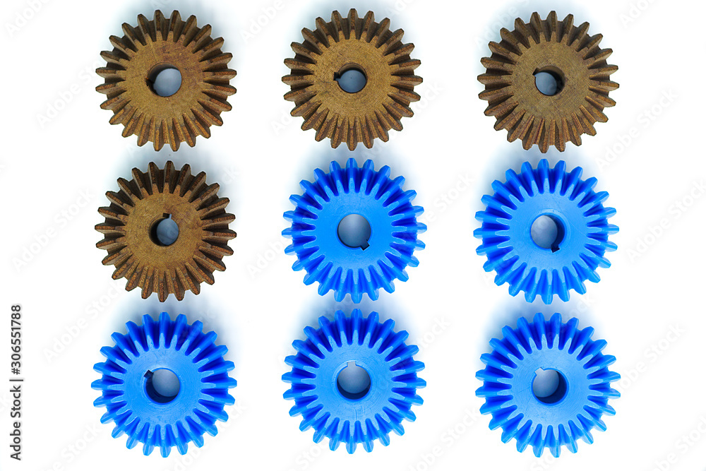 Bevel Gears in brown with many blue on a white background Leadership, identity, initiative, strategy, conflict, different ideas, business success concepts Bevel Gears in brown with many blue on a white background Leadership, identity, initiative, strategy, conflict, different ideas, business success concepts