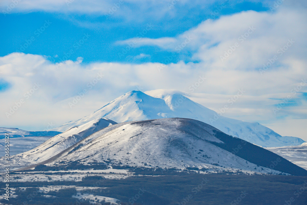 The city of Pyatigorsk. View of the peaks of the Elbrus burrow in the North Caucasus in Russia The city of Pyatigorsk. View of the peaks of the Elbrus burrow in the North Caucasus in Russia