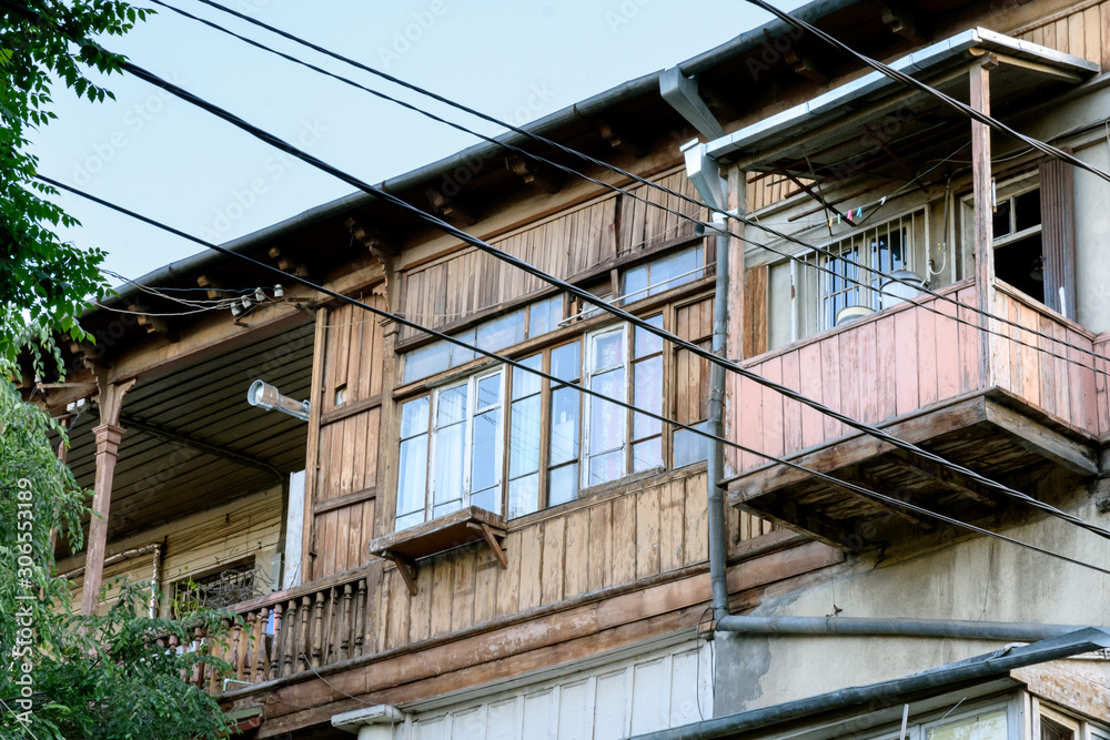 Traditional wooden balconies of residential building in center of Tbilisi Traditional wooden balconies of residential building in center of Tbilisi