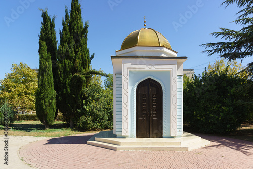Blue and white Muslim Durbe with a Golden dome in Marshal Sokolov square in Yevpatoria, Crimea photo