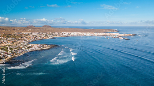 aerial view of waves crashing on the bay of corralejo  fuerteventura