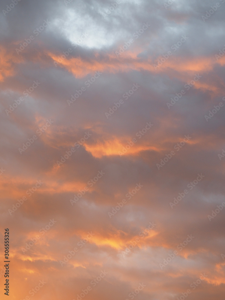 Orange-gray clouds at sunset.