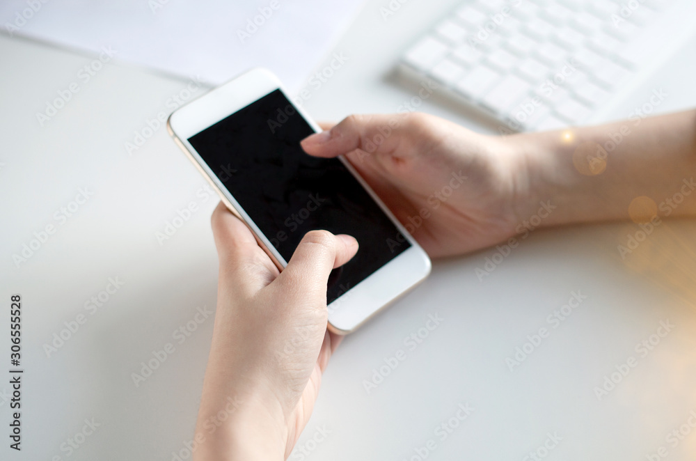 male hand holding mobile phone male hand holding mobile phone