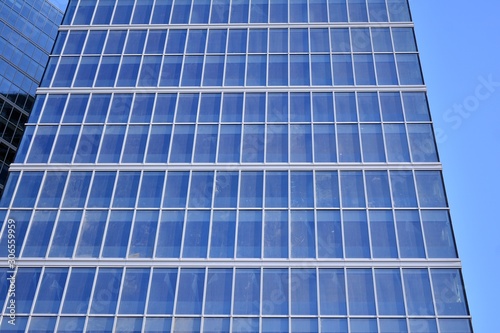 Wallpaper Mural Abstract texture of blue glass modern building skyscrapers. Business background. Torontodigital.ca
