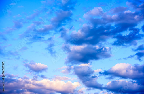 Beautiful puffy pastel colored clouds photo