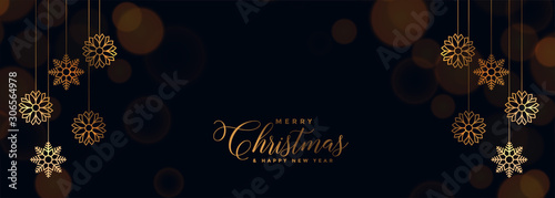 elegant black christmas banner with golden snowflakes