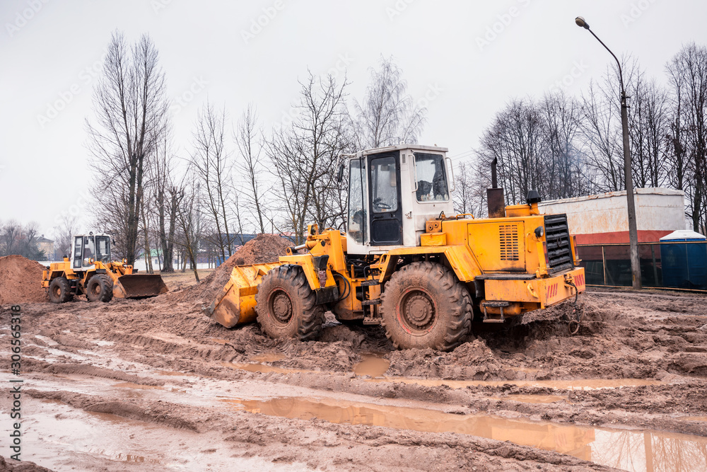 Off-road construction equipment. Deferred work due to dirt and mud. Flood management