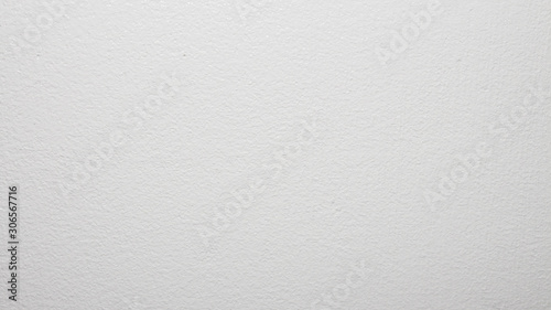 White concrete wall.Water-based paint background.The texture of the white painted walls.