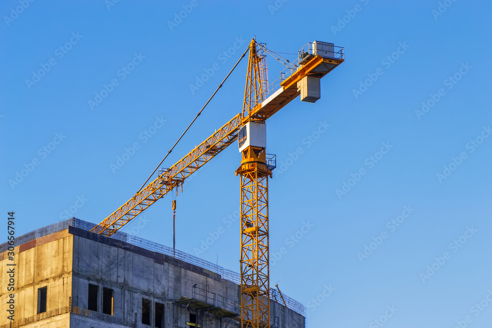 Construction site with crane and building. Construction of the new building