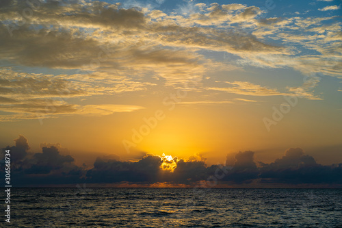 A magnificent sunrise over the Indian Ocean on the island of Zanzibar, Tanzania, Africa. Travel and nature concept