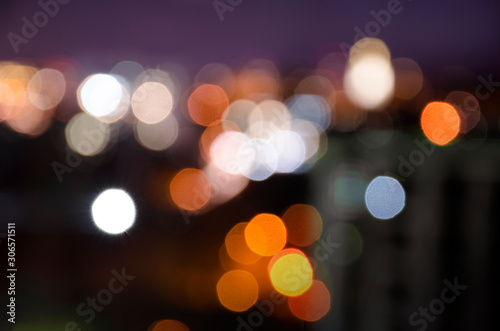 a beautiful background of colourful city lights © analeo