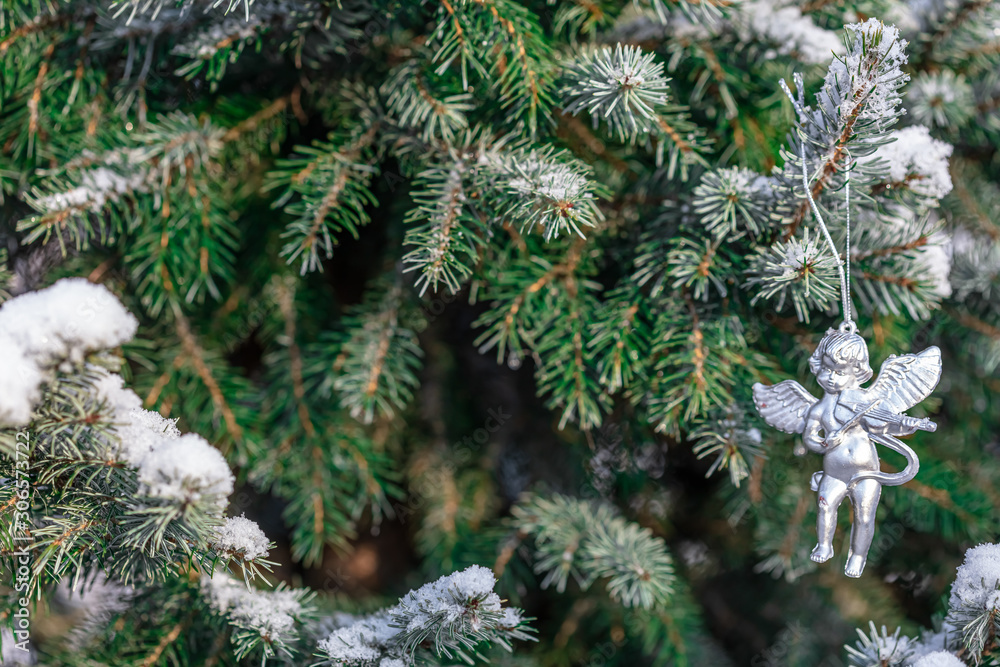 Christmas decoration on the tree, angel, bell,