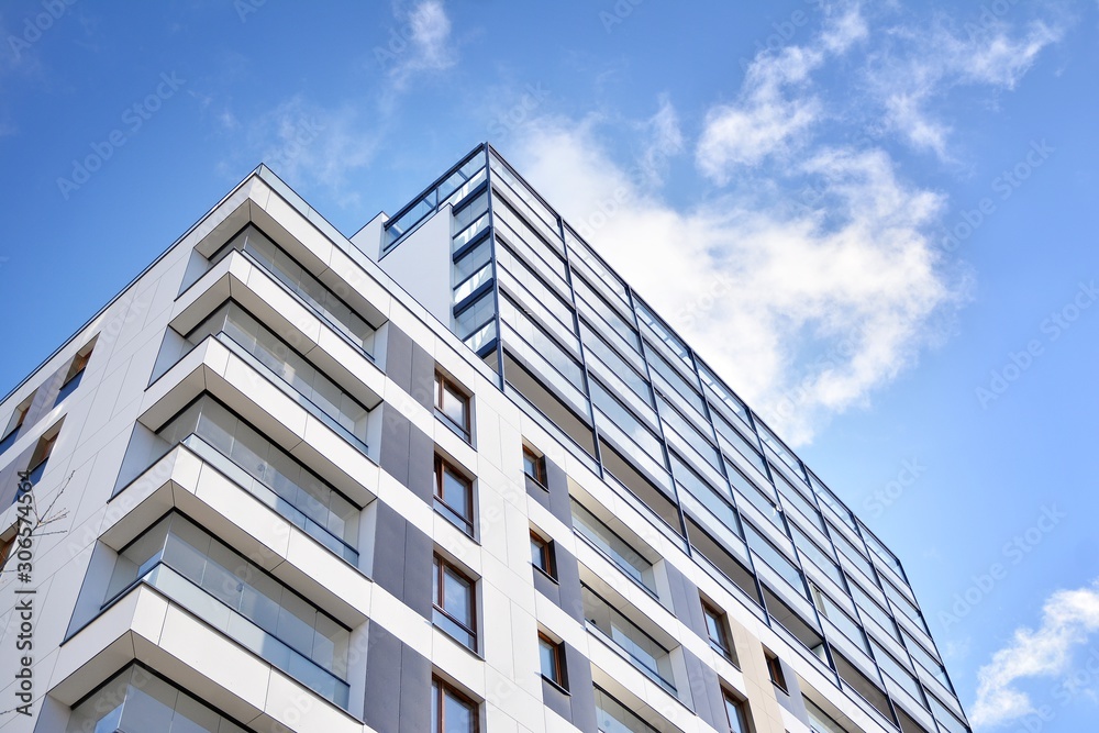 Fragment of modern residential apartment with flat buildings exterior. Detail of new luxury house and home complex. Fragment of modern residential apartment with flat buildings exterior. Detail of new luxury house and home complex.
