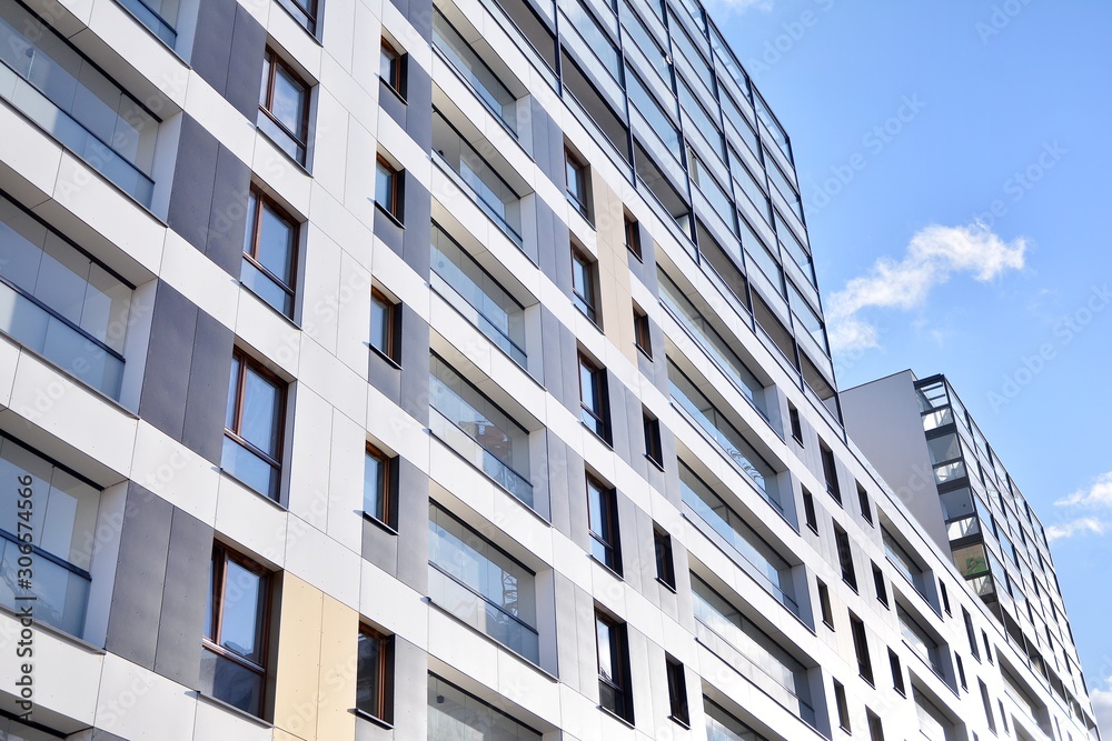 Fragment of modern residential apartment with flat buildings exterior. Detail of new luxury house and home complex. Fragment of modern residential apartment with flat buildings exterior. Detail of new luxury house and home complex.