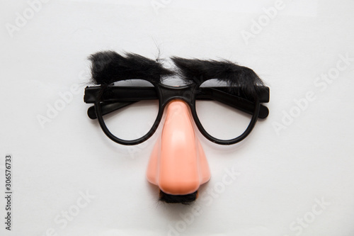 Closeup of a fake nose and glasses, with furry eyebrows Fototapet