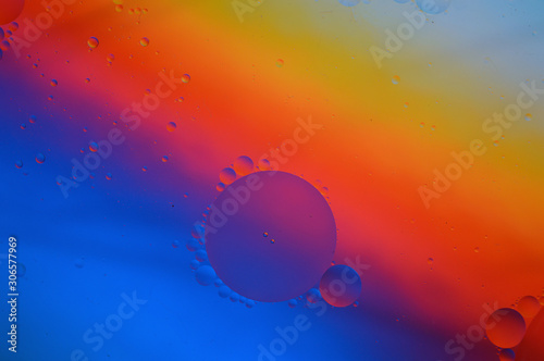 Background of colorful oil drops in water surface - abstraction