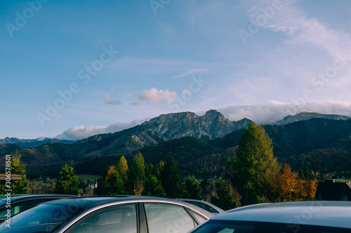 Car for traveling with a mountain view