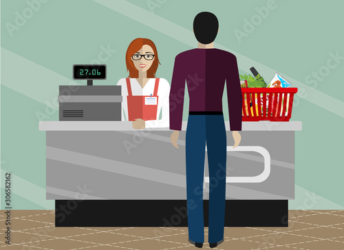 Supermarket store cashier woman or sales clerk at store. cashier working in the grocery store serving a customer