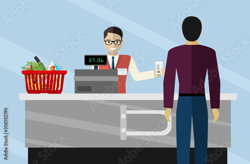 Supermarket store cashier man or sales clerk at store. cashier working in the grocery store serving a customer