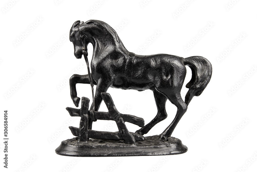 Figurine of a black horse on an isolated white background. Figurine of a black horse on an isolated white background.