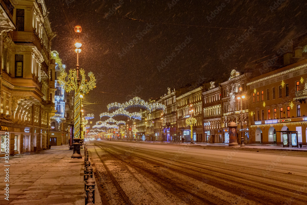  Snow-covered and decorated for the New year Nevsky prospect in the early December morning.