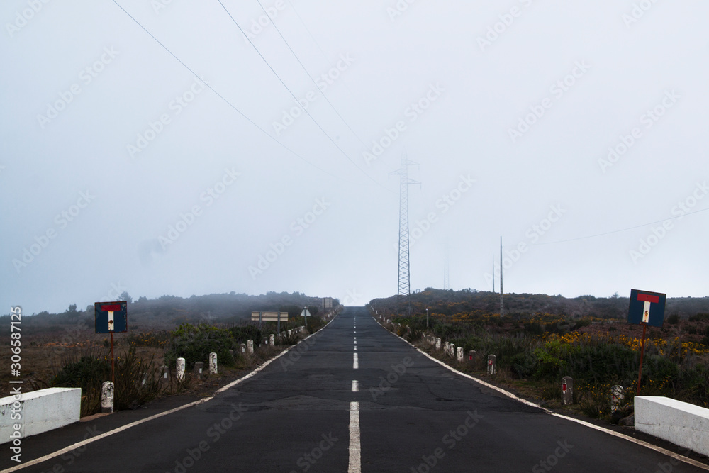 lonely road with fog at madeira 
