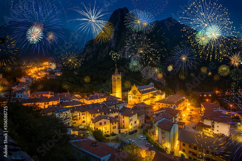 Cathedral of Santa Maria Assunta in Gemona with flashing fireworks in, Italy, Europe © Atmosphere