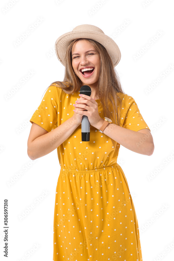 Beautiful young female singer with microphone on white background Beautiful young female singer with microphone on white background