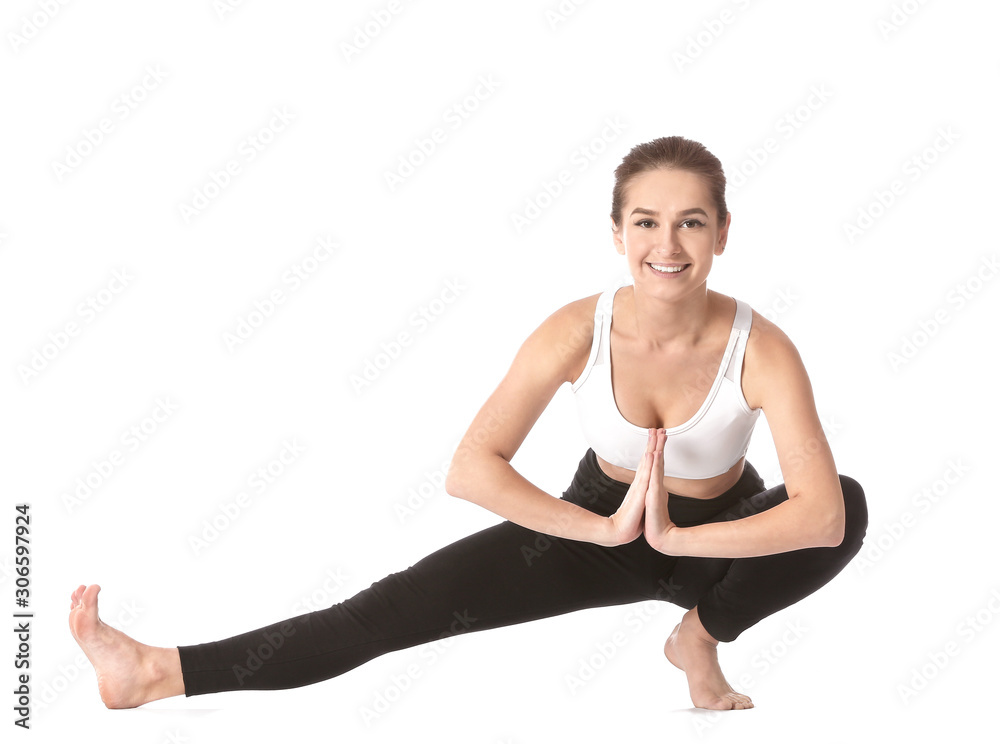 Beautiful young woman practicing yoga on white background Beautiful young woman practicing yoga on white background