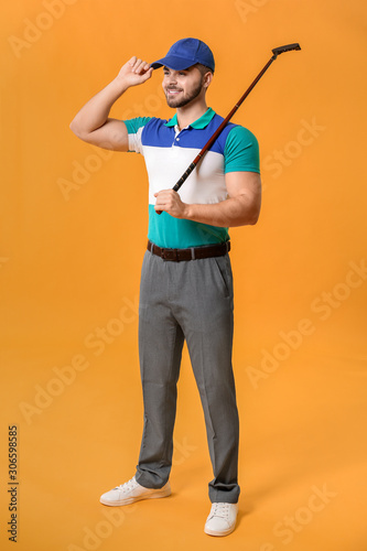 Handsome male golfer on col...