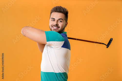 Handsome male golfer on col...