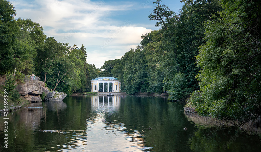 Obraz premium Beuatiful view of pond 'Ionian sea' and Flora Pavilion in park Sofiyivka , Uman, Ukraine