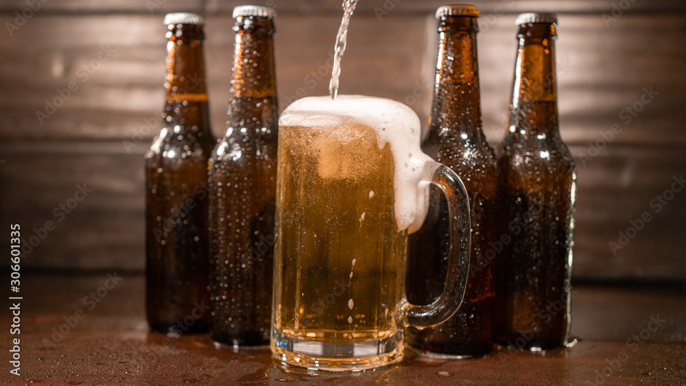Pint Of Beer Being Poured And Over Flowing