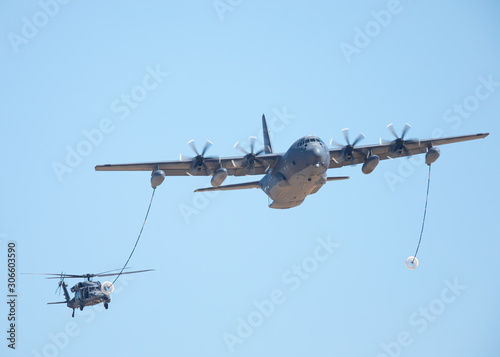 Fototapeta Naklejka Na Ścianę i Meble -  C-130J air refueling  a Black Hawk helicopter